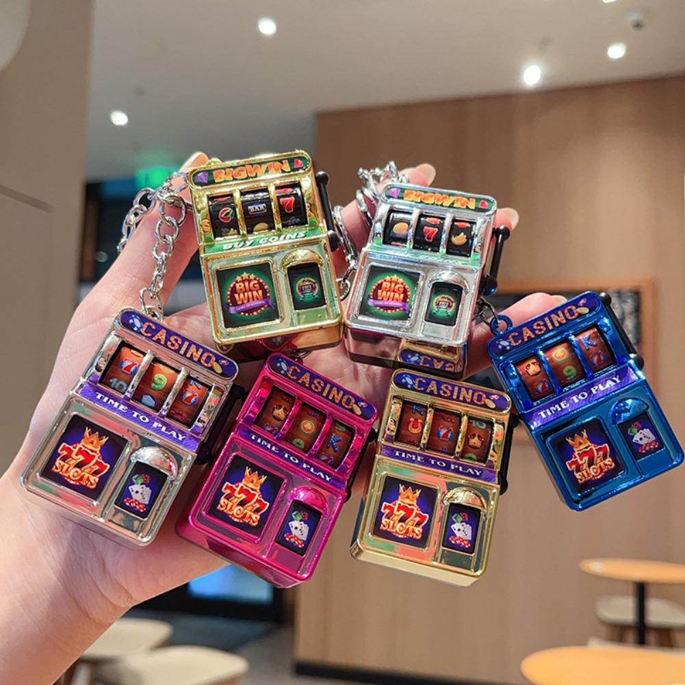 Porte-clés machine à sous tend - Fruit Slot Machine avis et prix