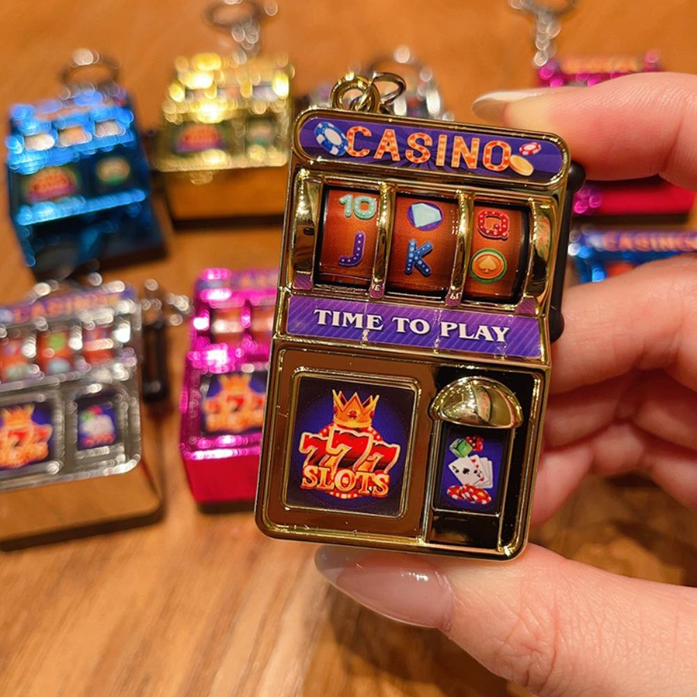 Porte-clés machine à sous tend - Fruit Slot Machine avis et prix